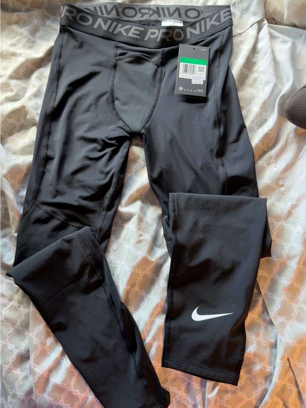 Nike Black Kids Compression Leggings with White Swoosh